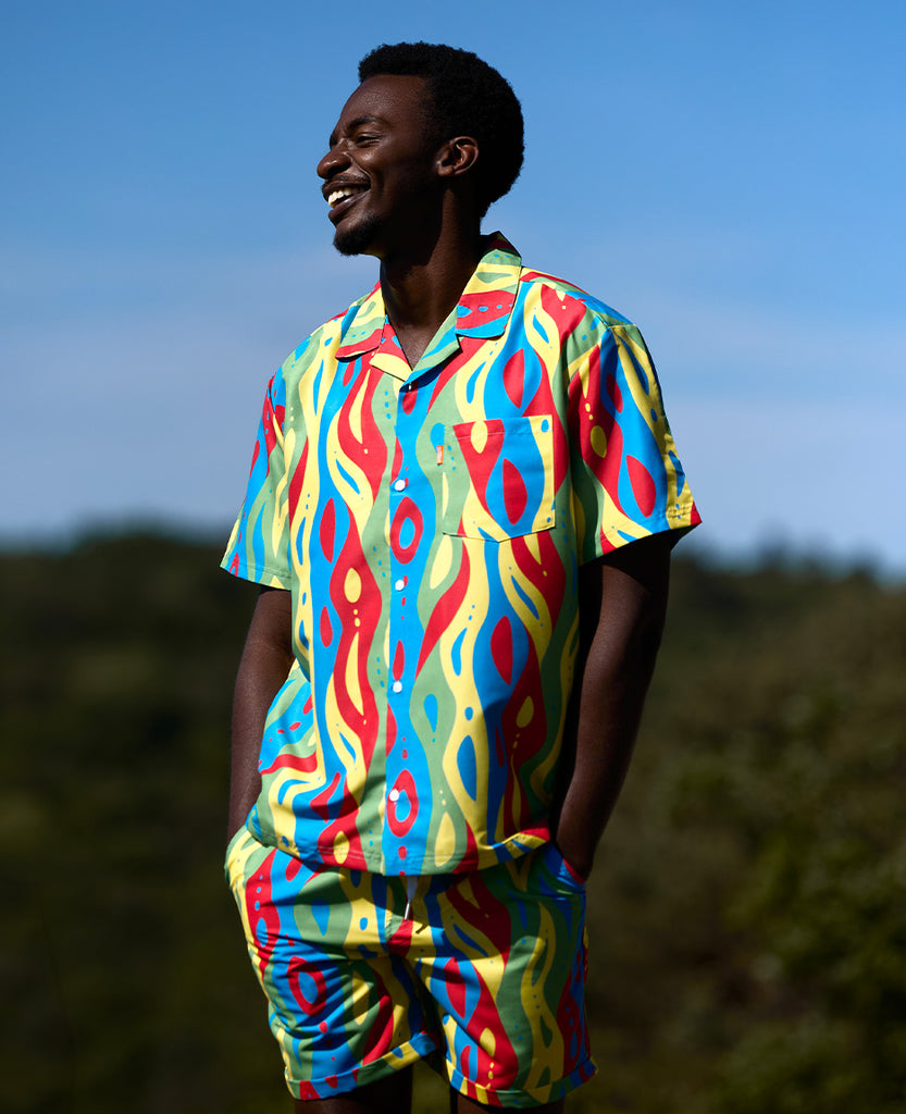 man wearing colorful summer set