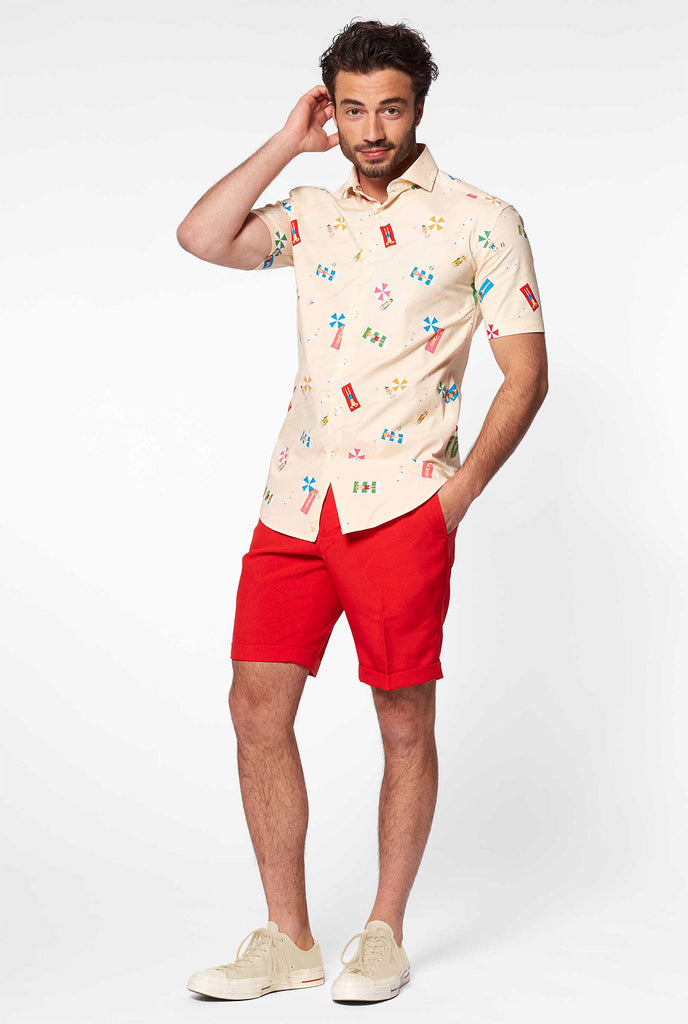 Man wearing summer shirt with beach icons