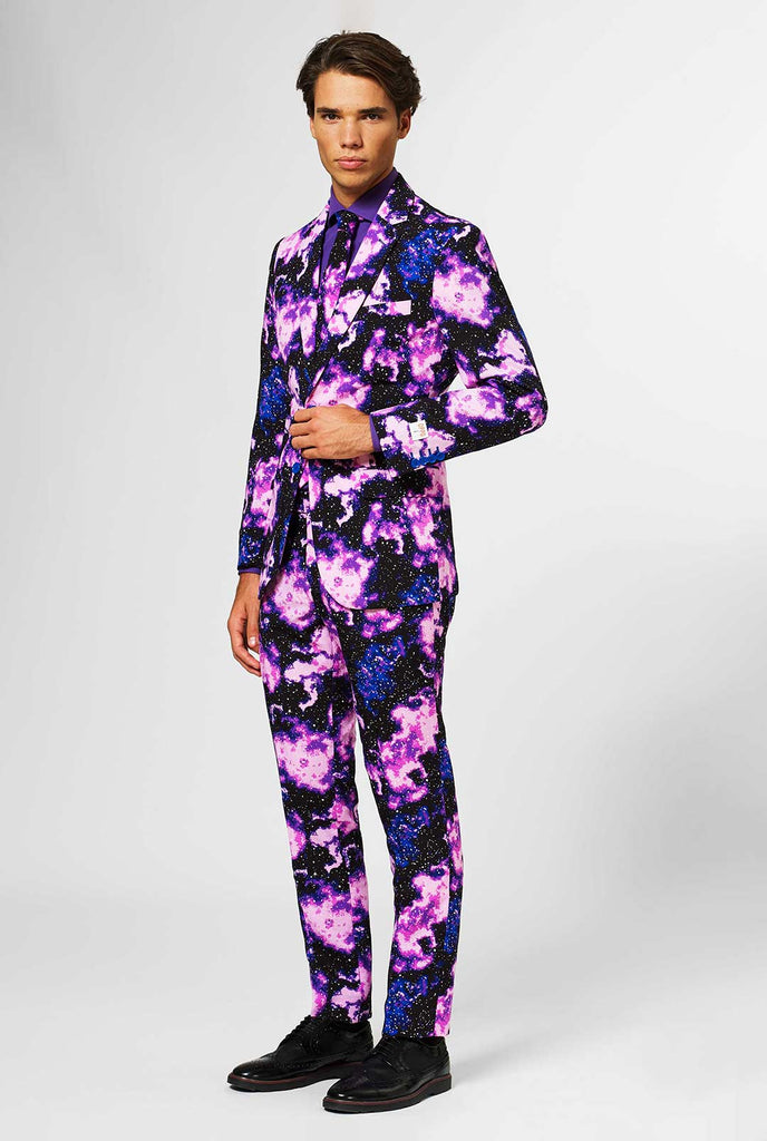 Man wearing suit with galaxy milkyway print