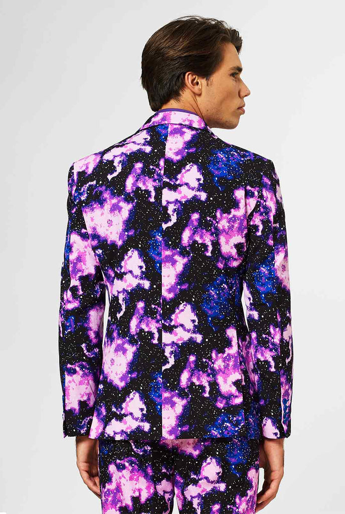 Man wearing suit with galaxy milkyway print