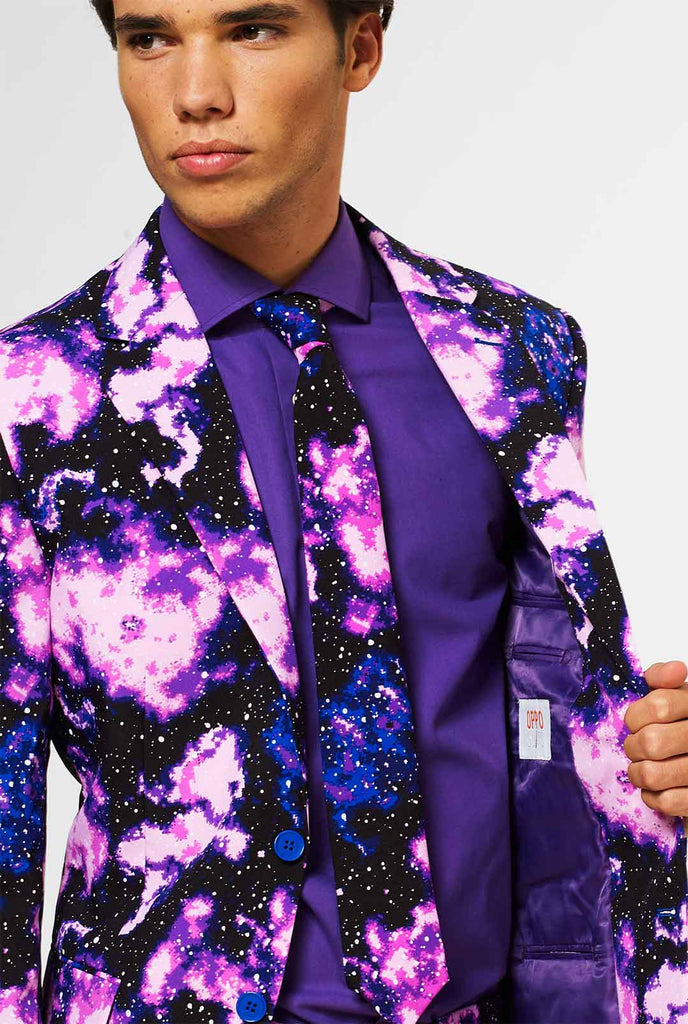 Man wearing suit with galaxy milkyway print