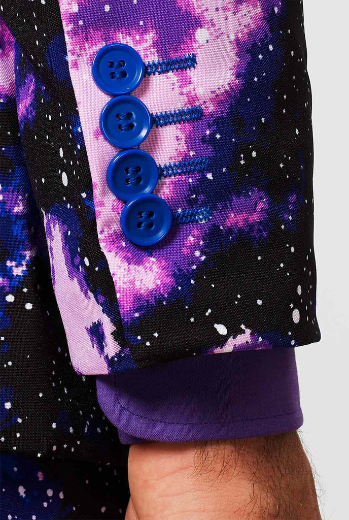 Man wearing suit with galaxy milkyway print