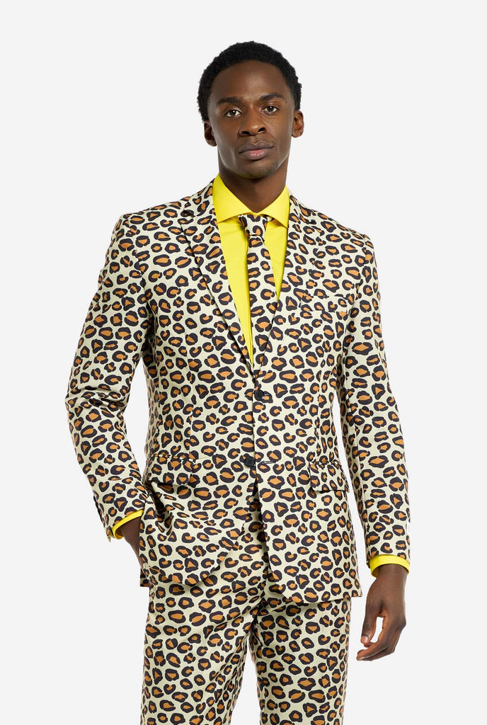 Image of a man wearing an OppoSuits The Jag men's suit with panther print and yellow men's shirt. Suit consist of pants, jacket and tie.