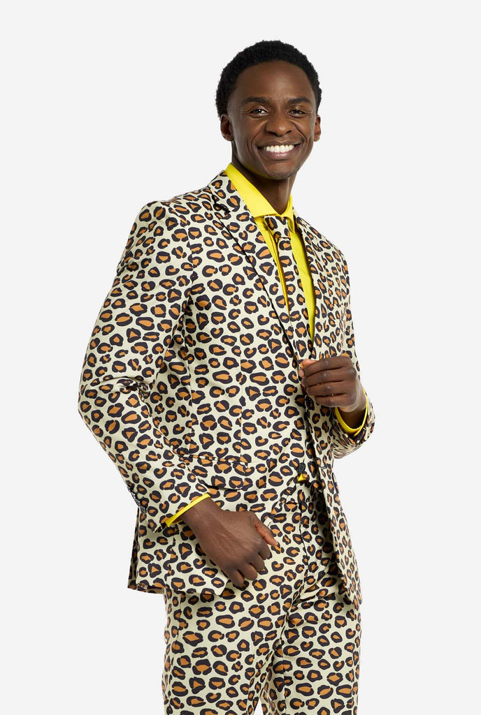 Image of a man wearing an OppoSuits The Jag men's suit with panther print and yellow men's shirt. Suit consist of pants, jacket and tie.