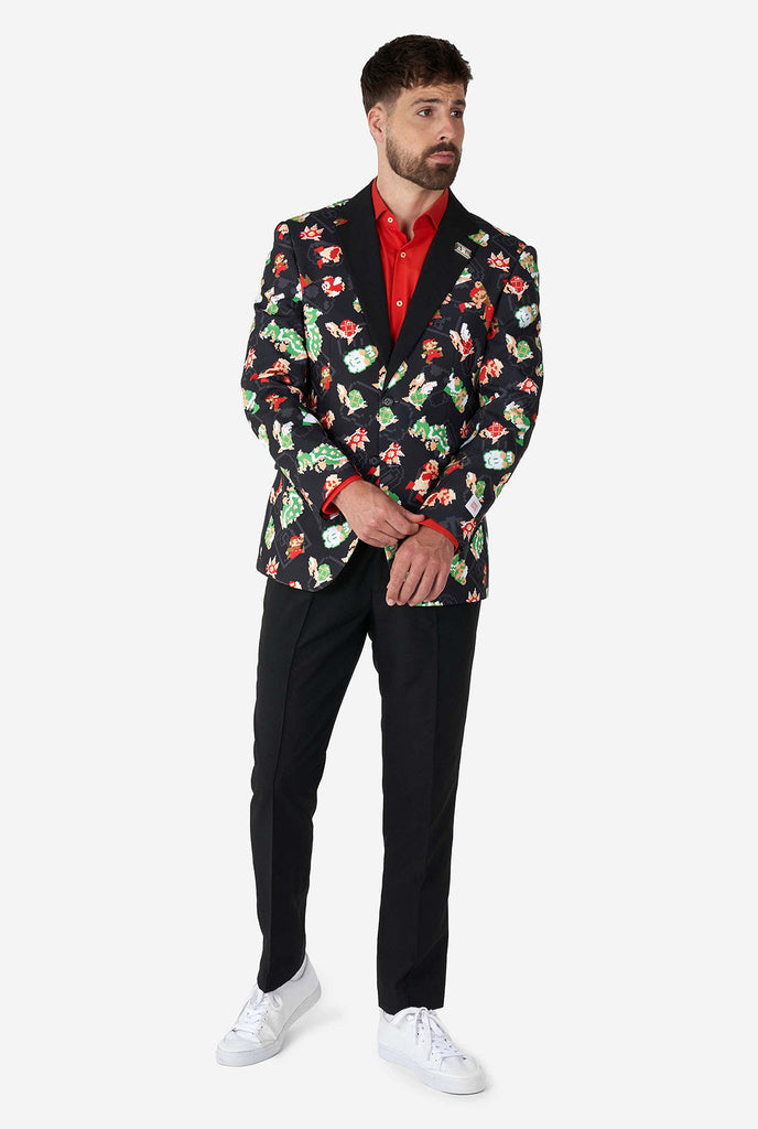 Man wearing black blazer with retro Super Mario characters print