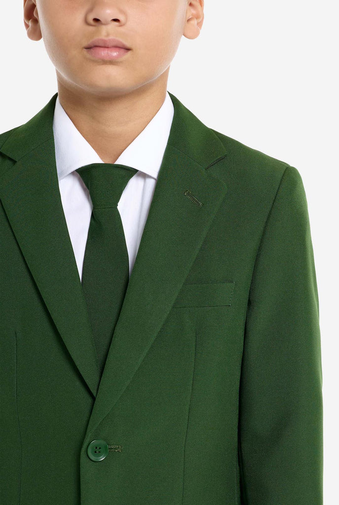 Teen wearing formal dark green suit, close up