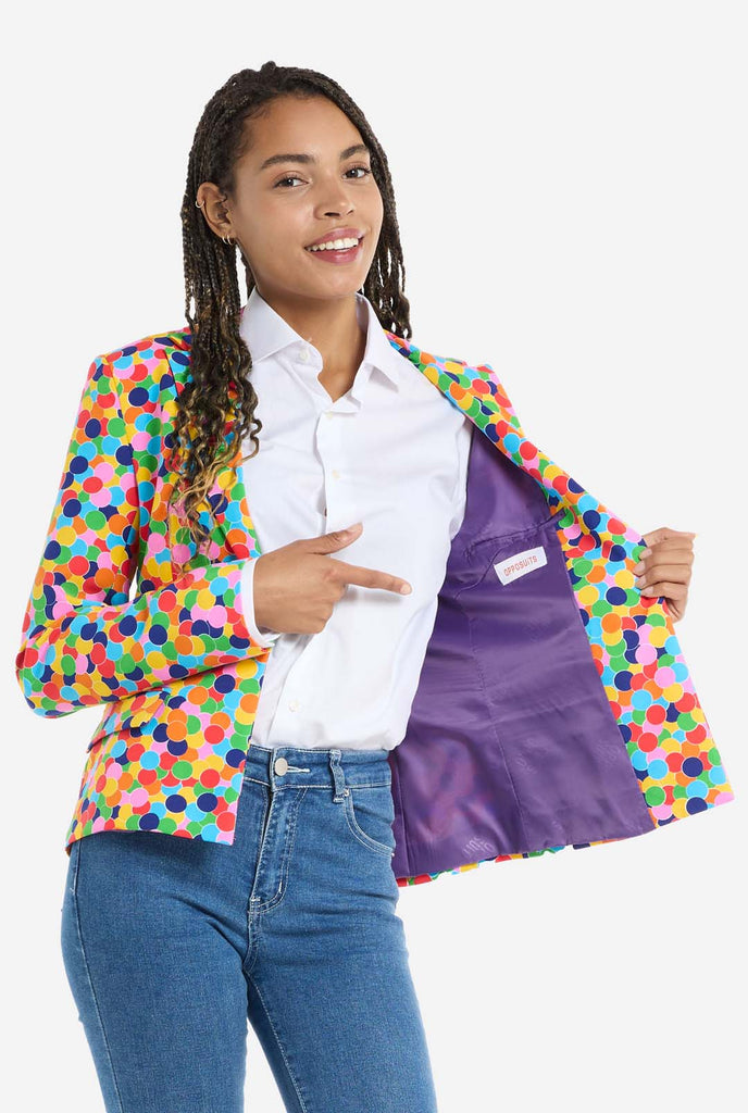 Woman wearing womens blazer with confetti print,