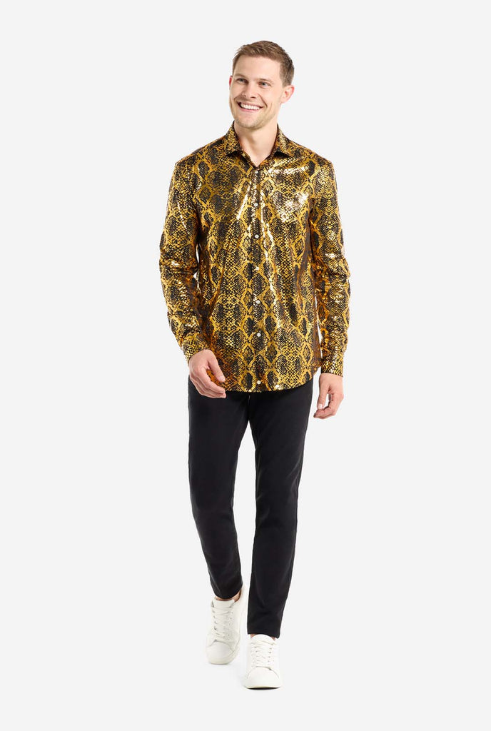 Man wearing shirt with golden foil snake skin print