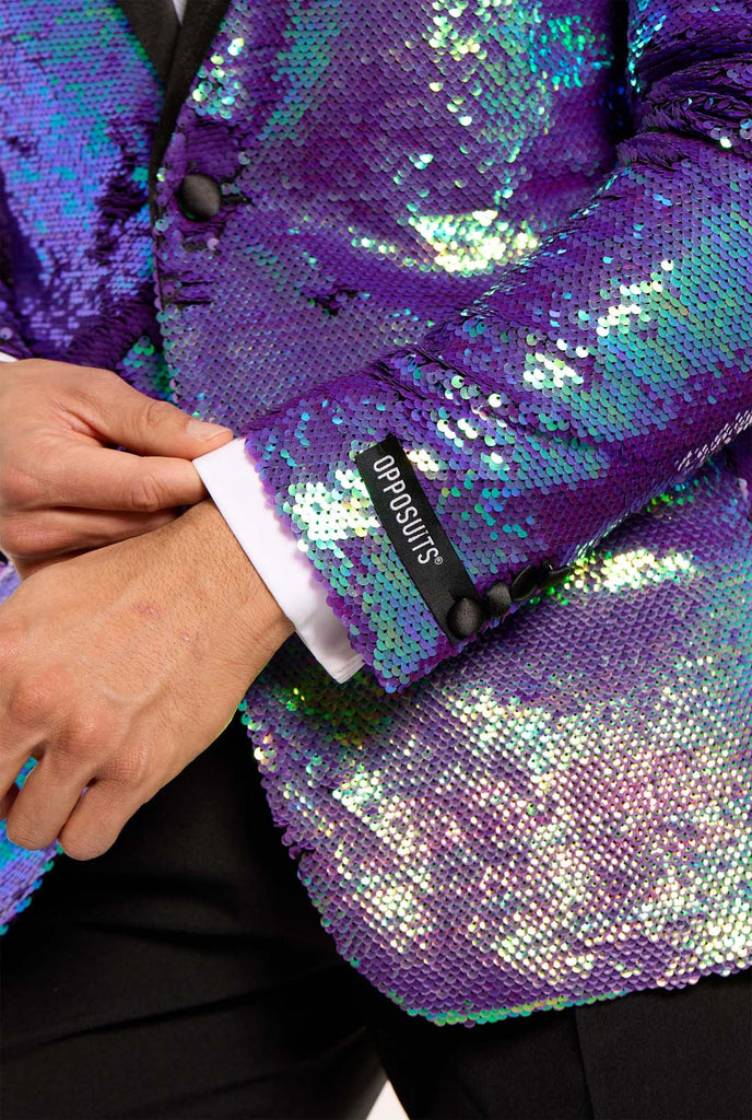 Men wearing tuxedo with blue sequins jacket, close up