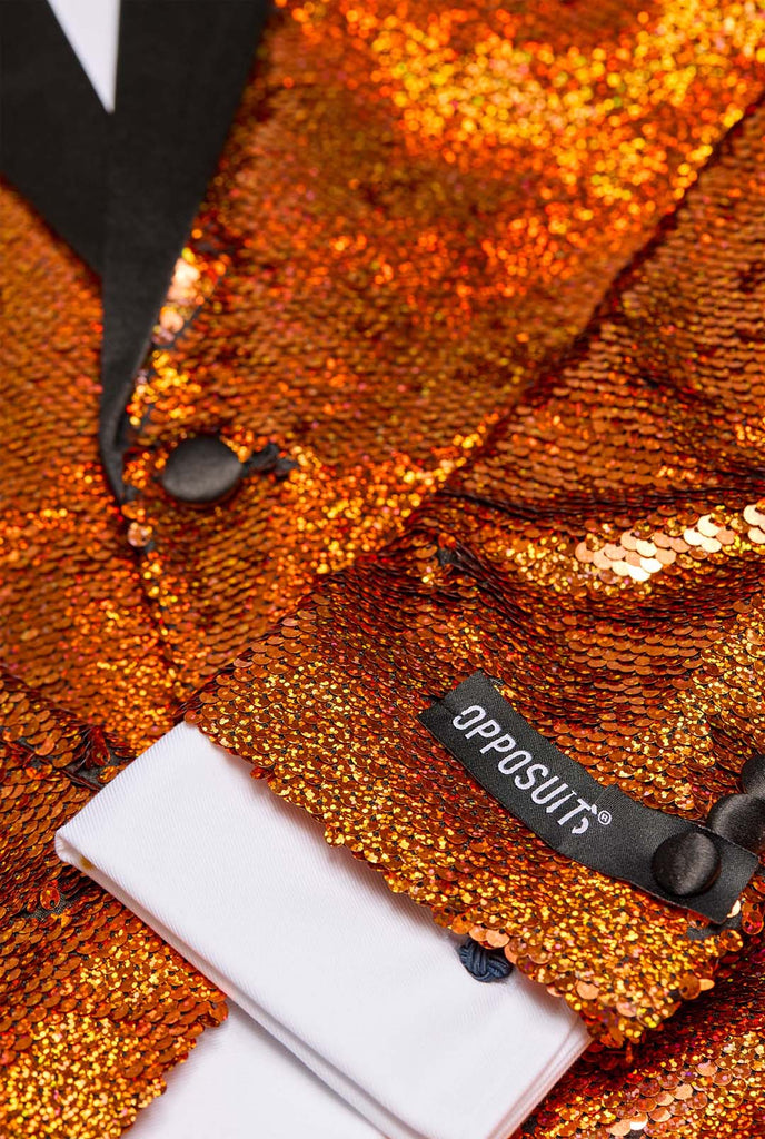 Men wearing tuxedo with orange sequins jacket, close up